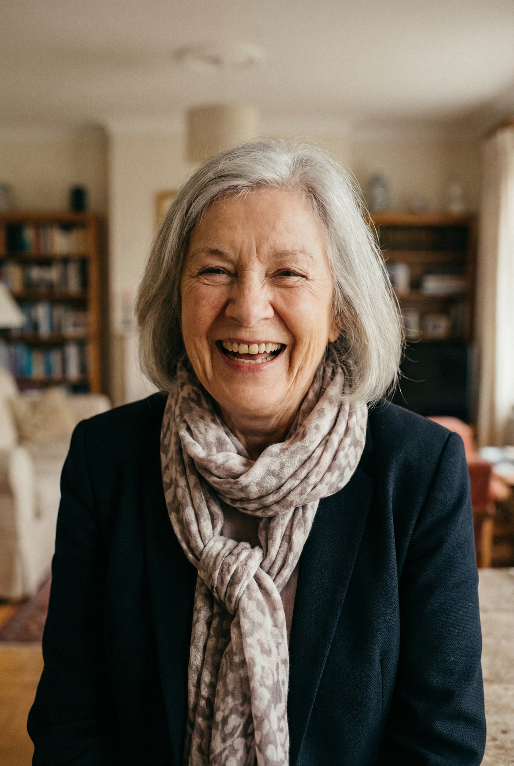 Grandma seated thoughtfully with a book in her library — calm, intellectual, full of wisdom.